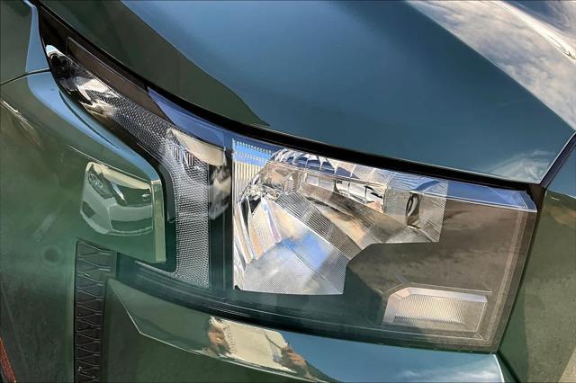 Photo of 2024 Tactical Green Metallic Nissan Frontier