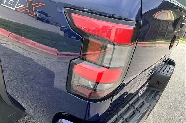Photo of 2022 Deep Blue Pearl Nissan Frontier