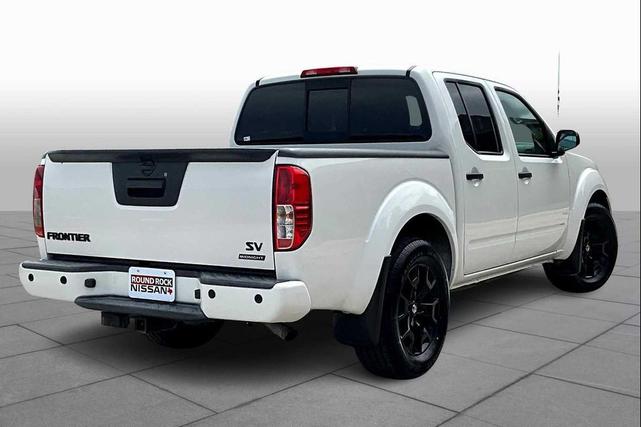 Photo of 2021 Glacier White Nissan Frontier