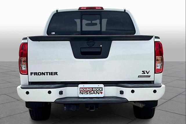 Photo of 2021 Glacier White Nissan Frontier