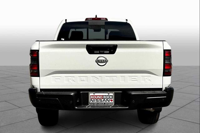 Photo of 2025 Glacier White Nissan Frontier