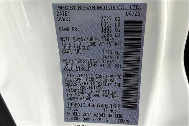 Photo of 2025 Glacier White Nissan Frontier