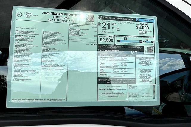 Photo of 2025 Glacier White Nissan Frontier