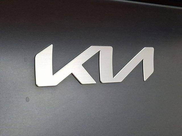 Photo of 2023 Shadow Matte Gray Kia Sportage Hybrid