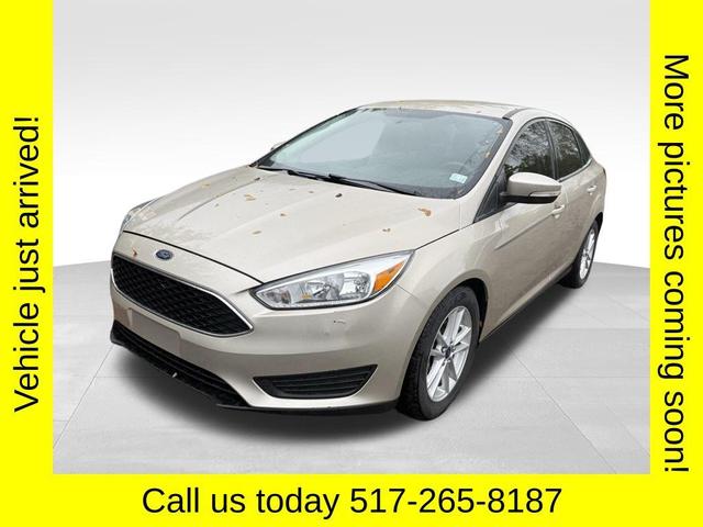Photo of 2017 White Gold Metallic Ford Focus