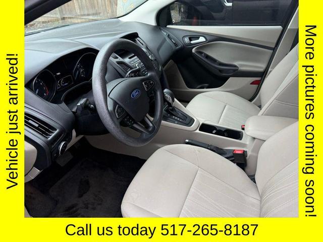 Photo of 2017 White Gold Metallic Ford Focus