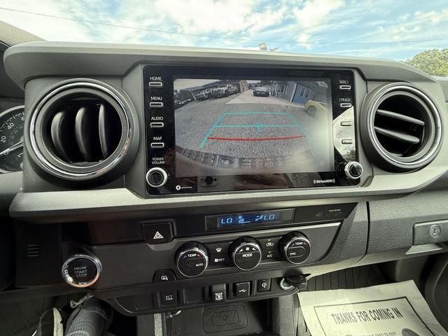 Photo of 2021 Midnight Black Metallic Toyota Tacoma
