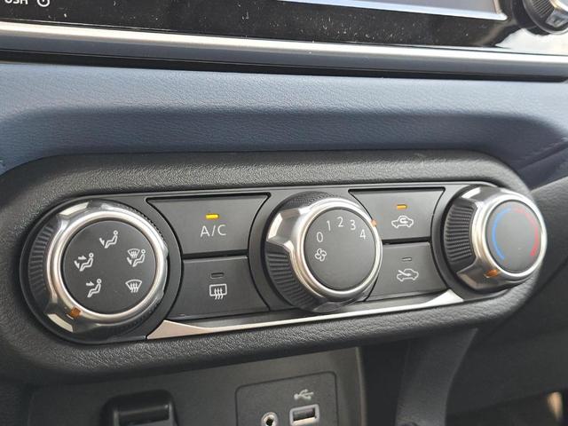 Photo of 2025 Aspen White Nissan Versa