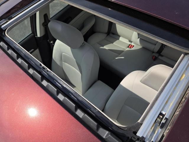 Photo of 2023 Garnet Pearl Nissan Altima
