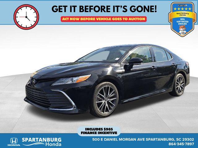 Photo of 2023 Midnight Black Metallic Toyota Camry