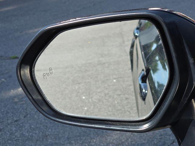 Photo of 2023 Midnight Black Metallic Toyota Camry