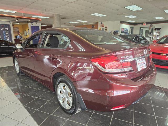 Photo of 2015 Crimson Pearl Honda Civic