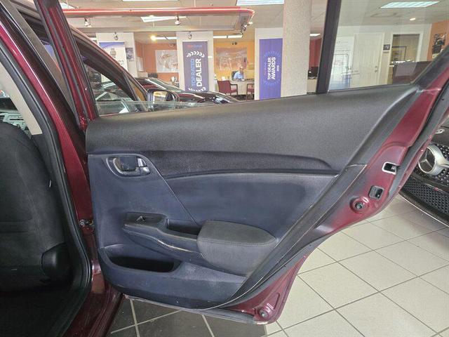 Photo of 2015 Crimson Pearl Honda Civic