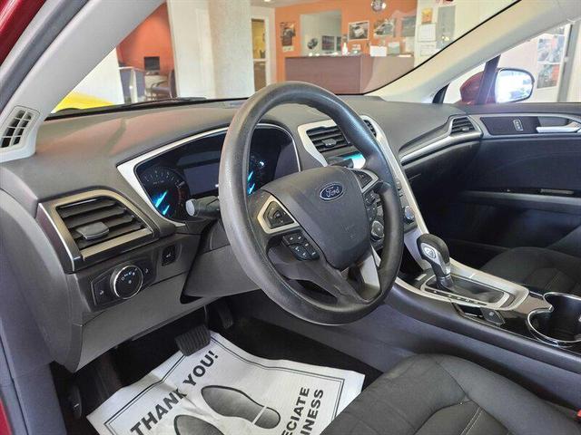 Photo of 2014 Ruby Red Metallic Tinted Clearcoat Ford Fusion