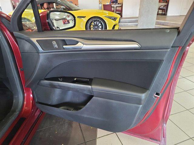 Photo of 2014 Ruby Red Metallic Tinted Clearcoat Ford Fusion