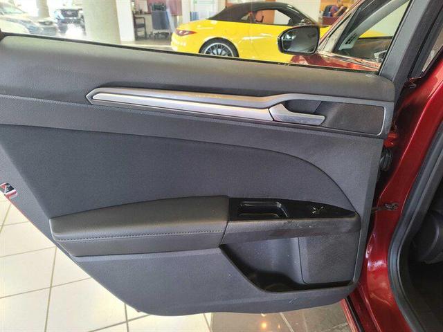 Photo of 2014 Ruby Red Metallic Tinted Clearcoat Ford Fusion