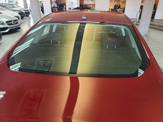 Photo of 2014 Ruby Red Metallic Tinted Clearcoat Ford Fusion