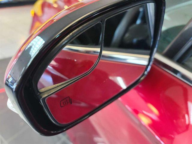 Photo of 2014 Ruby Red Metallic Tinted Clearcoat Ford Fusion