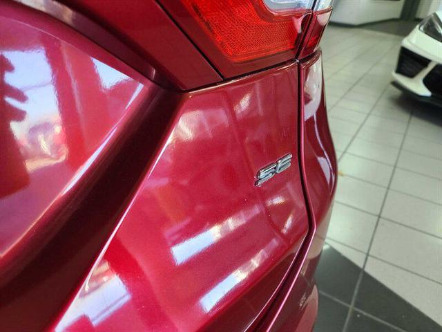 Photo of 2014 Ruby Red Metallic Tinted Clearcoat Ford Fusion