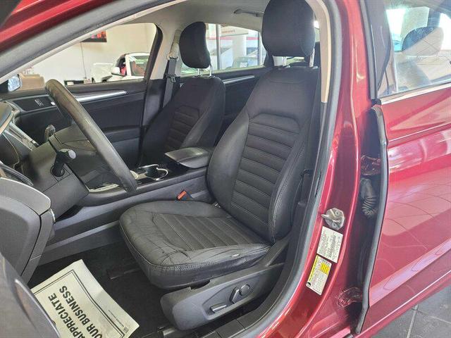 Photo of 2014 Ruby Red Metallic Tinted Clearcoat Ford Fusion