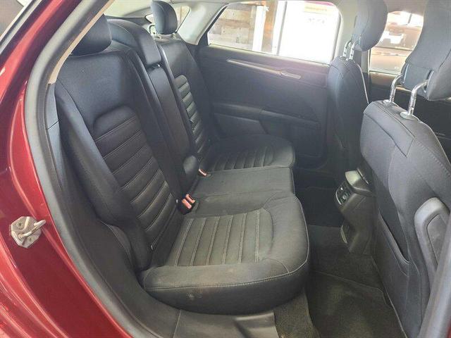 Photo of 2014 Ruby Red Metallic Tinted Clearcoat Ford Fusion