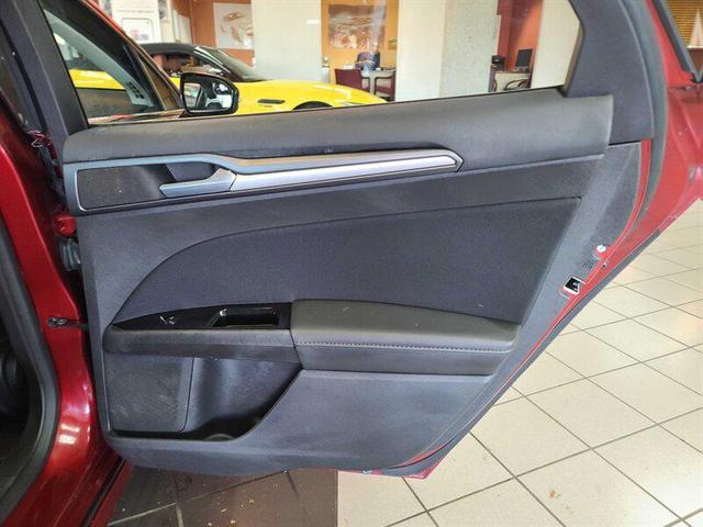 Photo of 2014 Ruby Red Metallic Tinted Clearcoat Ford Fusion
