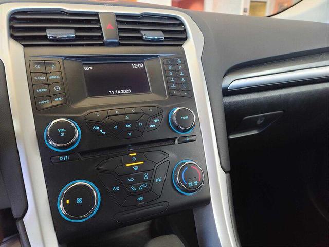 Photo of 2014 Ruby Red Metallic Tinted Clearcoat Ford Fusion
