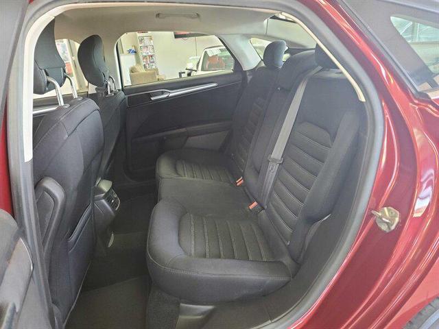 Photo of 2014 Ruby Red Metallic Tinted Clearcoat Ford Fusion
