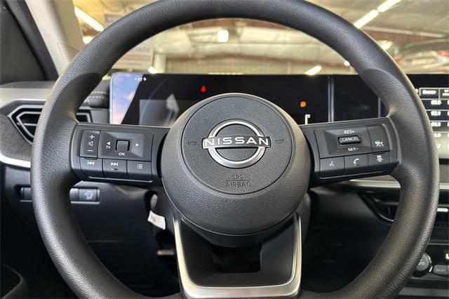 Photo of 2026 Aspen White Tricoat Nissan Kicks