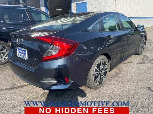 Photo of 2016 Aegean Blue Metallic Honda Civic