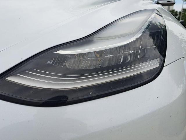 Photo of 2020 Pearl White Multi Tesla Model 3