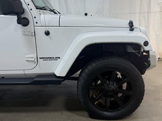 Photo of 2011 Bright White Clearcoat Jeep Wrangler Unlimited