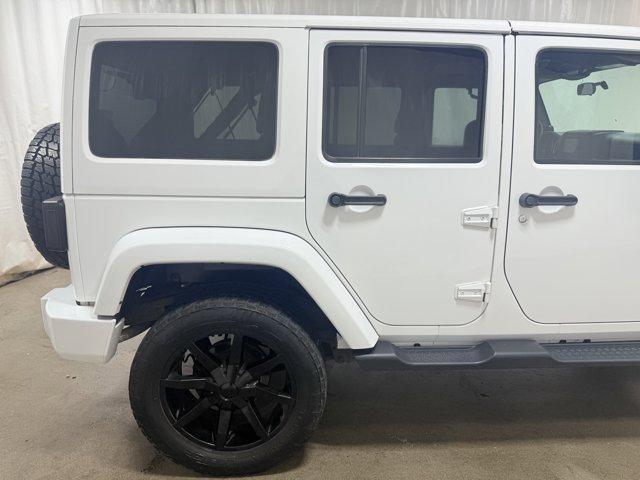 Photo of 2011 Bright White Clearcoat Jeep Wrangler Unlimited