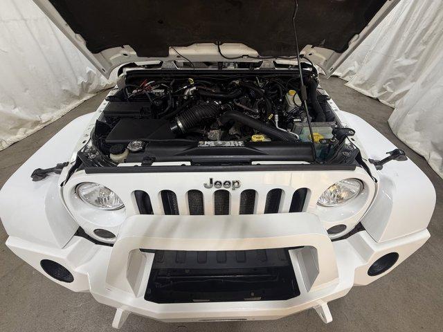 Photo of 2011 Bright White Clearcoat Jeep Wrangler Unlimited