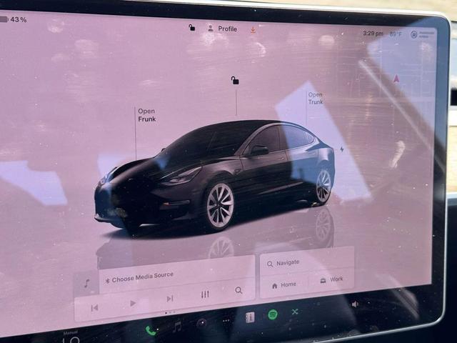 Photo of 2022 black Tesla Model 3