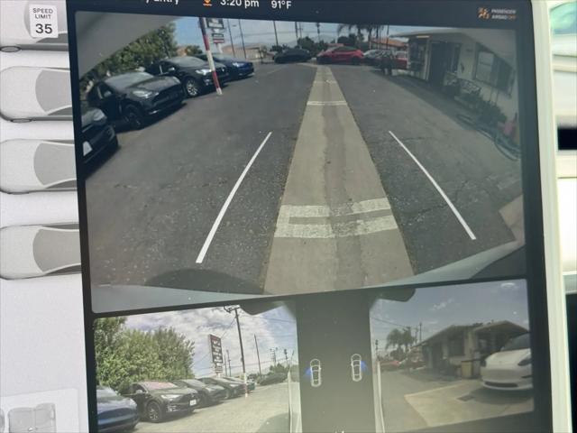Photo of 2021 Pearl White Multi-Coat Tesla Model Y