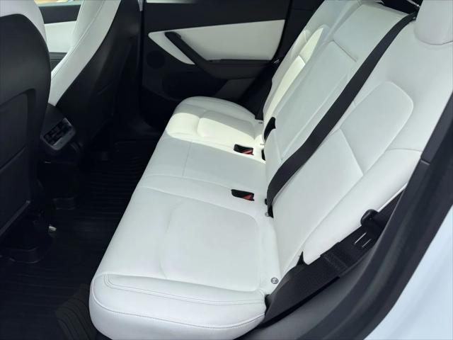 Photo of 2021 Pearl White Multi-Coat Tesla Model Y