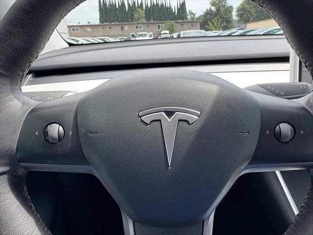 Photo of 2021 Pearl White Multi-Coat Tesla Model Y