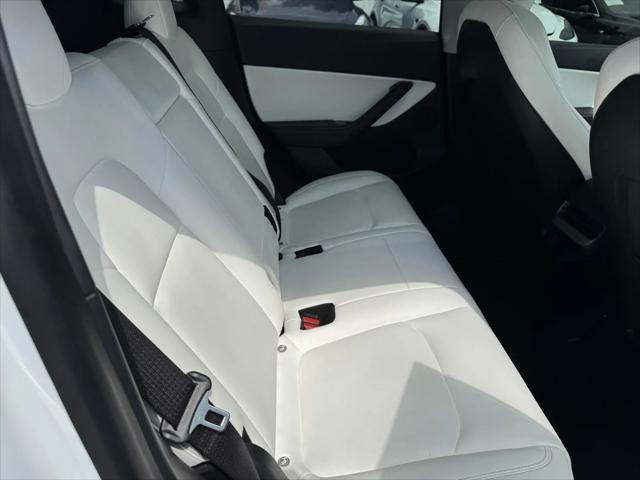 Photo of 2021 Pearl White Multi-Coat Tesla Model Y
