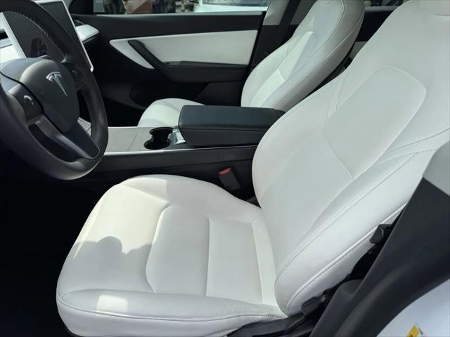 Photo of 2021 Pearl White Multi-Coat Tesla Model Y