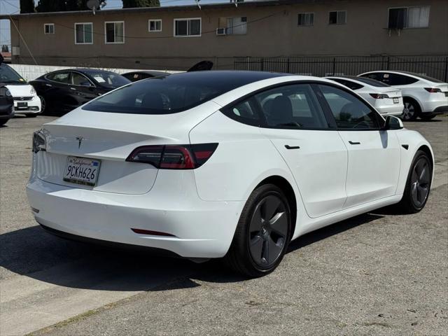 Photo of 2022 Pearl White Multi-Coat Tesla Model 3