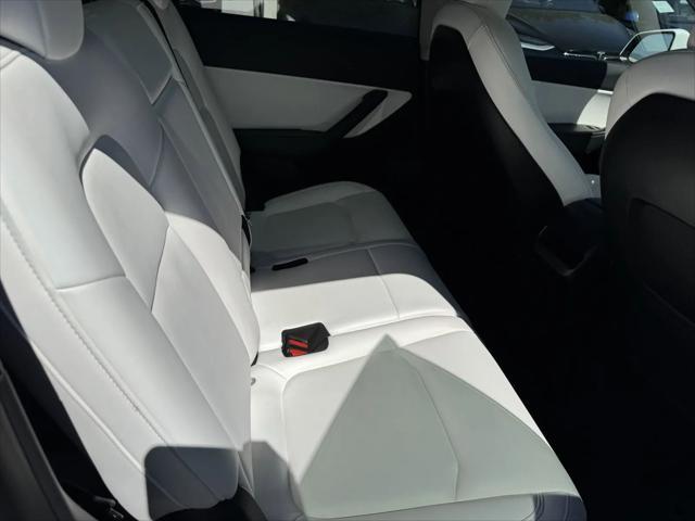Photo of 2021 Pearl White Multi-Coat Tesla Model Y