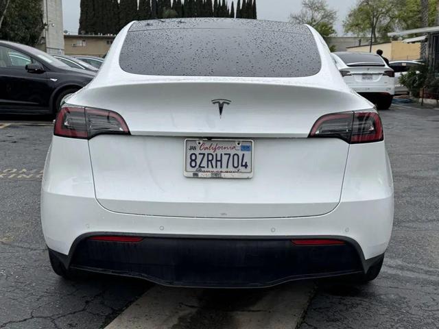Photo of 2022 Pearl White Multi-Coat Tesla Model Y