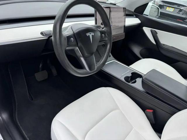 Photo of 2022 Pearl White Multi-Coat Tesla Model Y