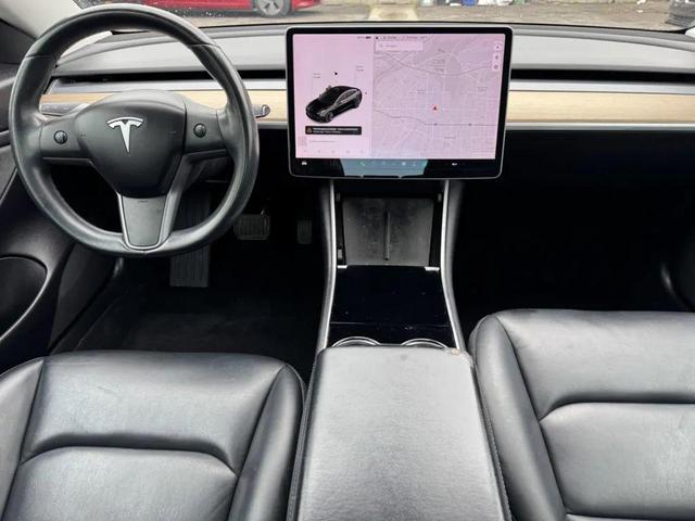 Photo of 2019 Solid Black Tesla Model 3