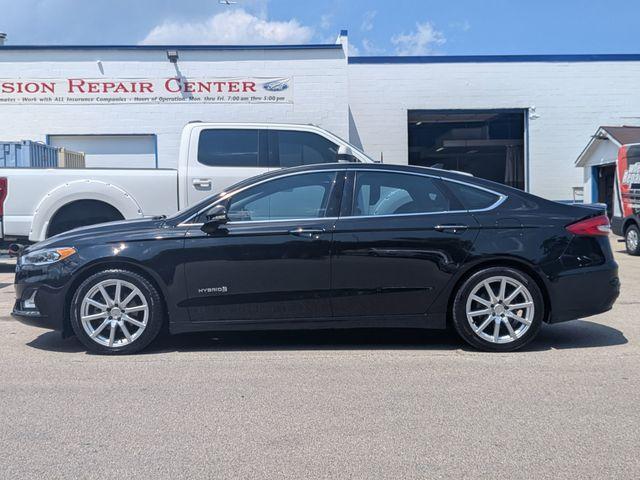 Photo of 2019 Black Ford Fusion Hybrid