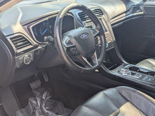Photo of 2019 Black Ford Fusion Hybrid