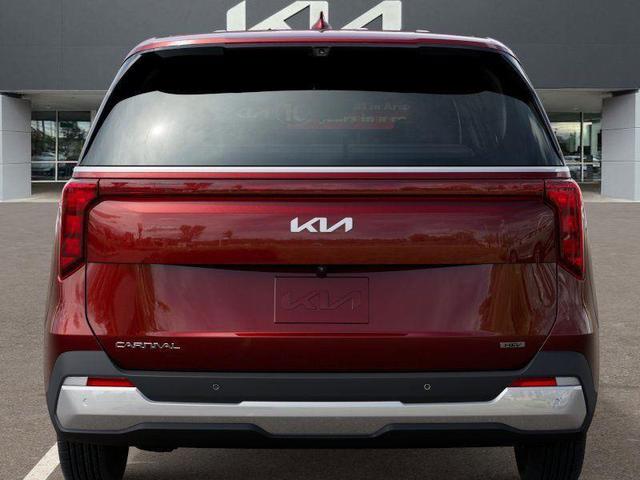 Photo of 2026 Flare Red Kia Carnival Hybrid