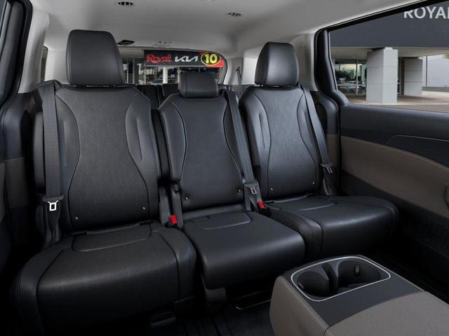 Photo of 2026 Flare Red Kia Carnival Hybrid