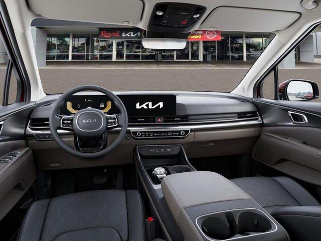 Photo of 2026 Flare Red Kia Carnival Hybrid